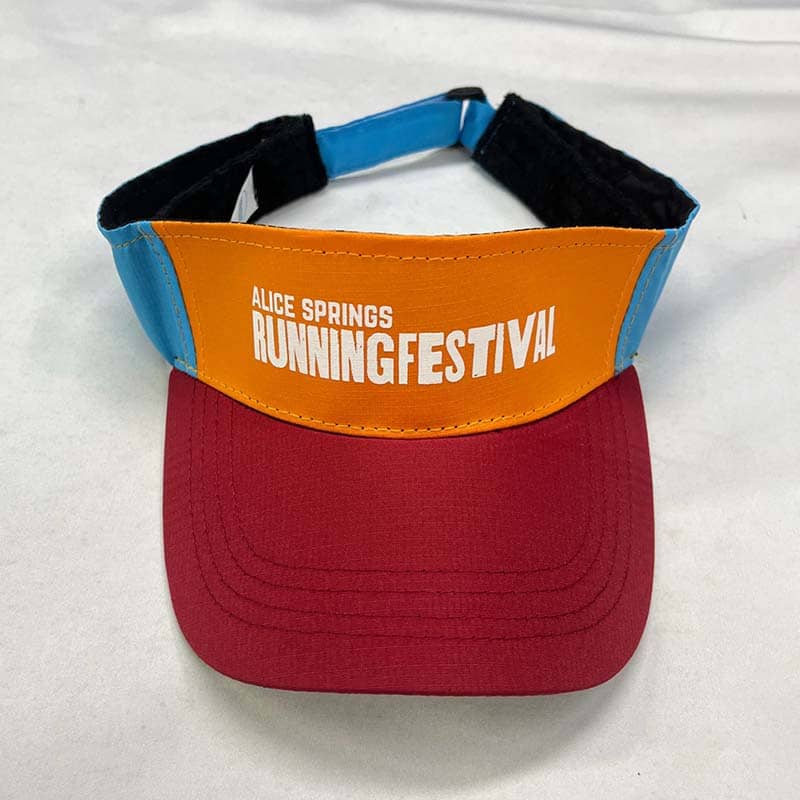 A visor hat with a yellow and blue band and a red brim, featuring the text "Alice Springs Running Festival" in white on the front. This stylish piece of custom merchandise is displayed on a white background.